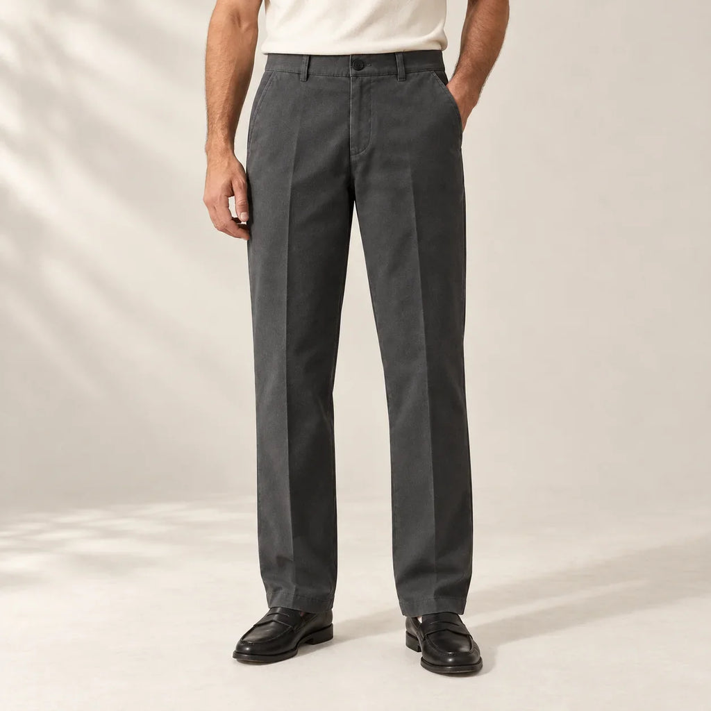 Charcoal straight-leg trousers worn with an ivory tee