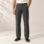 Charcoal straight-leg trousers worn with an ivory tee